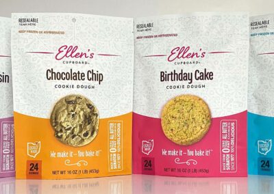 Ellen's Cupboard frozen cookie dough packaging in 4 flavors